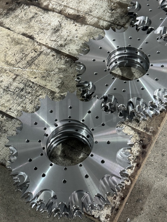 Apa fungsi utama sproket pada peralatan mekanik?